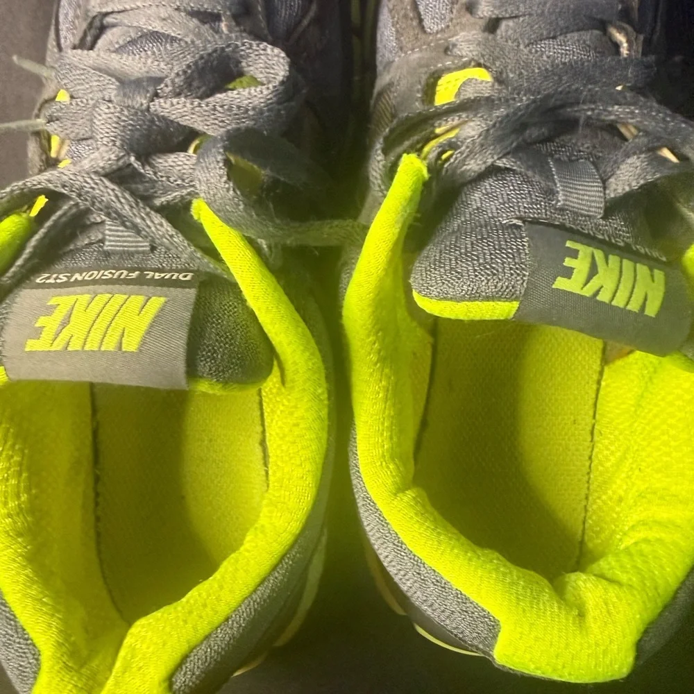 Nike women’s Gray and Neon Green Dual Fusion Sneakers